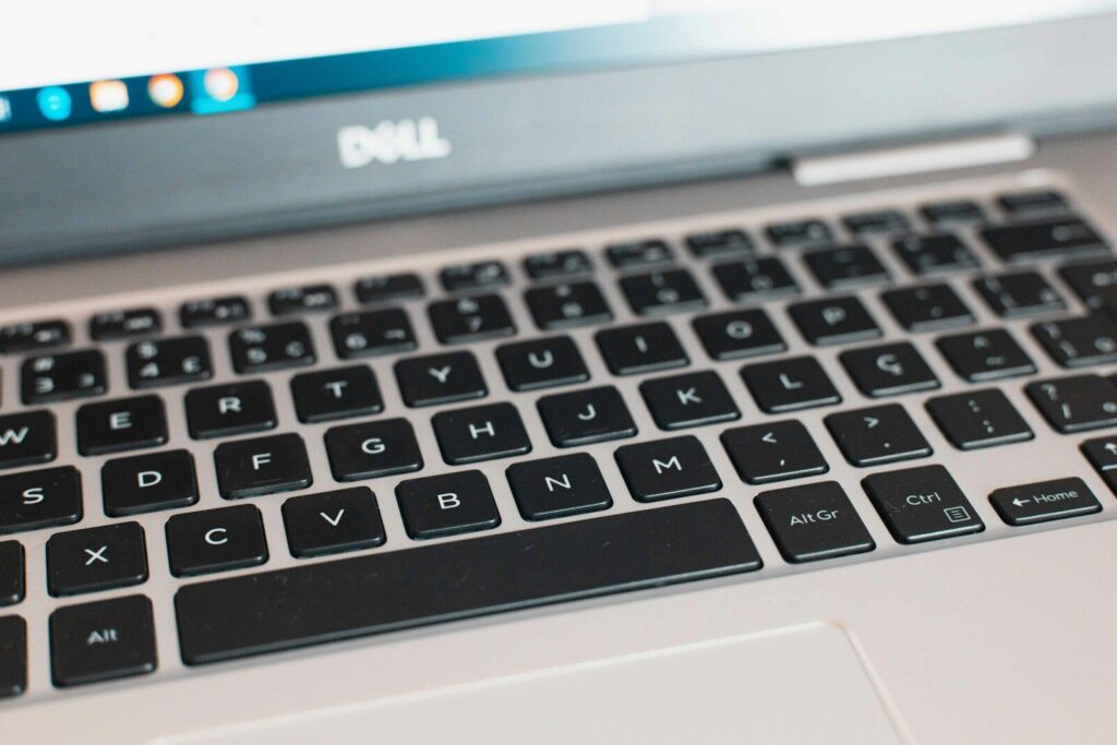 black and silver asus laptop computer